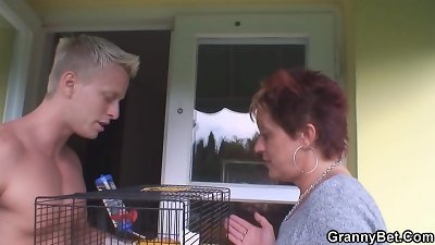 aged grandmother spreads legs